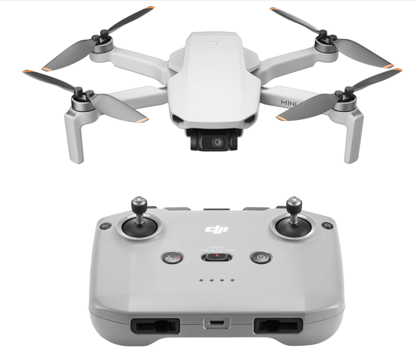 Compact gray drone with its remote controller