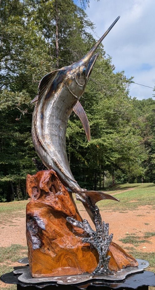 James Williams metal marlin sculpture on a decorative wood base